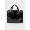 Lacquered bag with front pockets