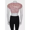 Top with ruffles and print