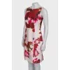 White dress in bright red print