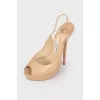 High-heeled leather sandals