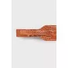 Light brown embossed belt