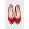 Red snakeskin embossed shoes
