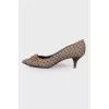 Textile pumps in houndstooth print