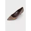 Textile pumps in houndstooth print