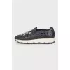 Black sneakers with perforations and rhinestones