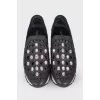 Black sneakers with perforations and rhinestones