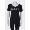 Black T-shirt with white lettering