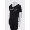 Black T-shirt with white lettering
