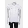 White T-shirt with golden buttons