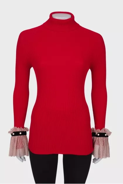 Golf with lace ruffles on the cuffs