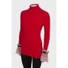 Golf with lace ruffles on the cuffs