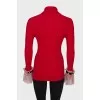 Golf with lace ruffles on the cuffs