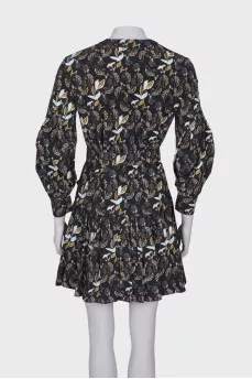 Black dress with pleated hem
