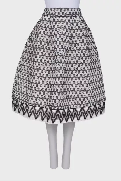 Black and white skirt with tag pockets