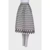 Black and white skirt with tag pockets