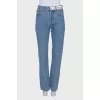 Blue jeans with brand logo