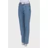 Blue jeans with brand logo
