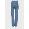 Blue jeans with brand logo