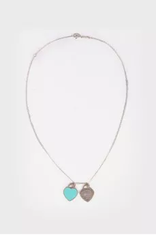 Silver pendant in the shape of two hearts