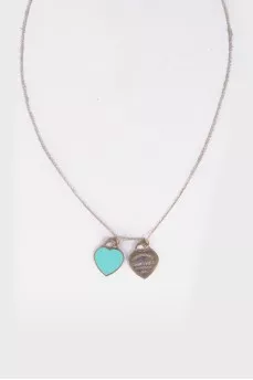 Silver pendant in the shape of two hearts