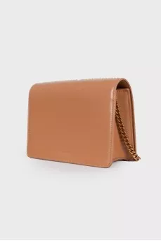 Bag with golden rhinestones