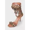 Leather sandals with bells