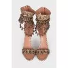 Leather sandals with bells