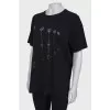 Black T-shirt with silver print