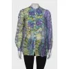 Sheer blouse with ruffles