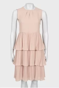 Dress with ruffles at the hem