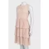 Dress with ruffles at the hem