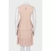 Dress with ruffles at the hem