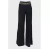 Palazzo trousers with embellished belt