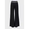 Palazzo trousers with embellished belt