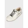 Leather sneakers with brand logo