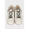 Leather sneakers with brand logo
