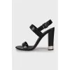 High-heeled leather sandals