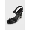 High-heeled leather sandals