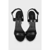 High-heeled leather sandals