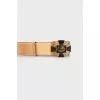 Leather belt with golden buckle