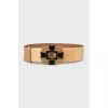 Leather belt with golden buckle