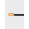 Dark blue belt with golden buckle