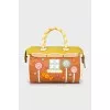 Leather bag decorated with appliqué