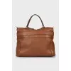 Brown bag with gold hardware