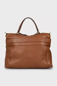 Brown bag with gold hardware