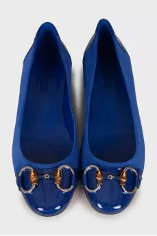 Blue ballet flats with patent toe