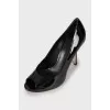 Patent leather stiletto heeled shoes 