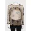 Sheer blouse with ruffles