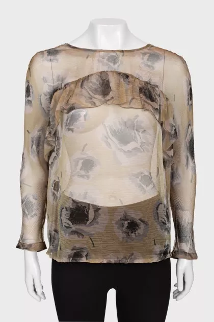 Sheer blouse with ruffles