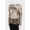 Sheer blouse with ruffles